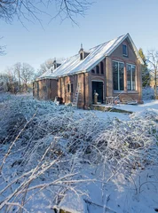 Foto auf Leinwand Old schoolbuilding. Boschoord. Colonial house. Koloniehuisje. Maatschappij van Weldadigheid. Drenthe Netherlands. Winter, Snow © A