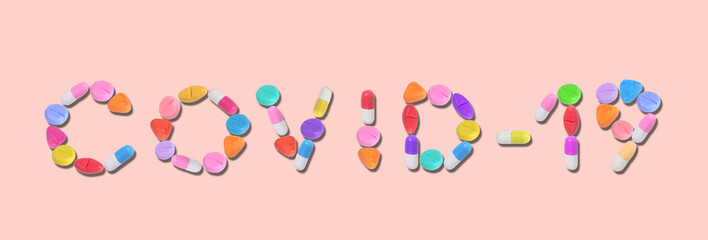 miniature blue drug model arrange in word (covid - 19) on pastel background