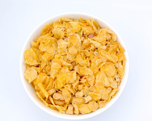 cereal in a white bowl on background. Healthy breakfast concept.