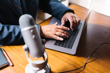 Businessman recording a podcast