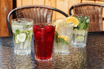Bright autumn cocktails of lemonade with zirus fruits.
