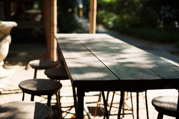 Wooden table of the outdoors cafe