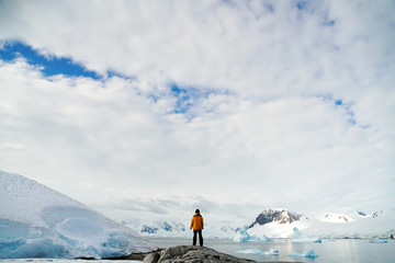 Girl on Top of Snowy Mountain