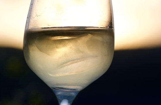 relax with a fresh delicious glass german riesling white wine on a table