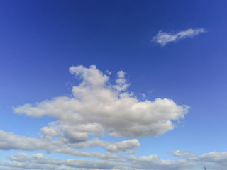 Naklejka na ściany i meble Simple blue cloudy sky, Nature background, day time.