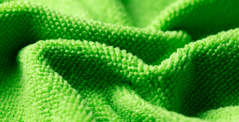 Fototapeta na wymiar Green fabric as an abstract background.
