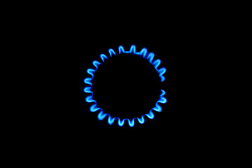 The blue flame of a cooker burner