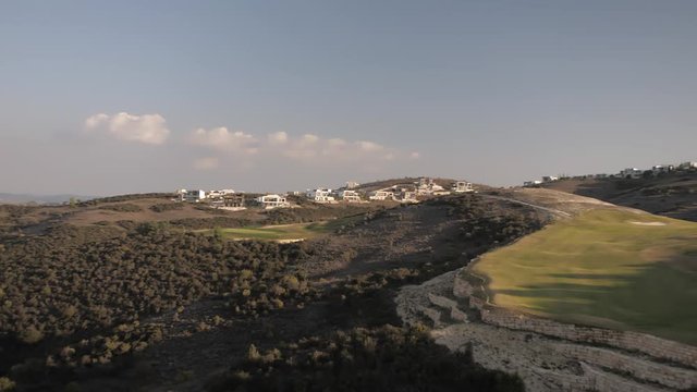 Moving shot of villas on the hills 