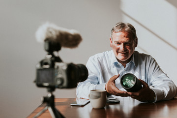 Man working in front of a camera