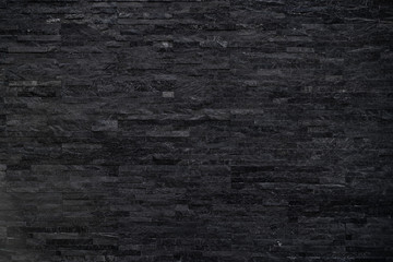 Detailed structure of abstract mottled granite with black cracked beige colors pattern stone for background surface, interiors, skin tile luxurious design,wallpaper or cover case mobile phone.