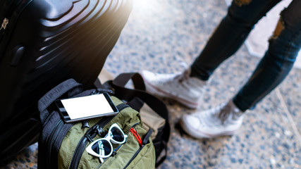 Solo woman backpacker traveler plan safety trip low cost budget summer holiday after coronavirus. Empty tourists on train railway platforms. Use bus train sustainable environmental friendly transport