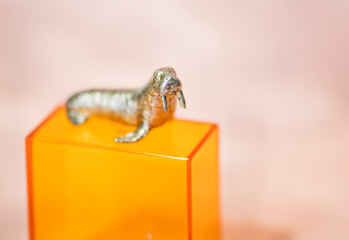 Colorful and bright miniature walrus figures