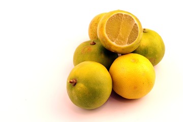 Green lemon fruit on white background