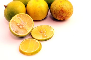 Fototapeta na wymiar Green lemon fruit on white background