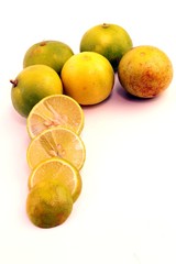 Green lemon fruit on white background