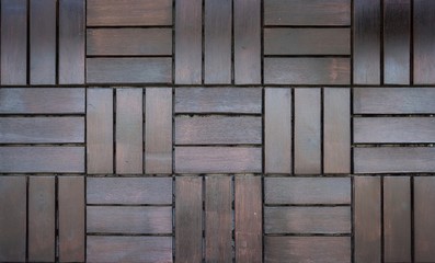 background of dark brown wooden tiles 