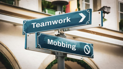 Street Sign to Teamwork versus Mobbing