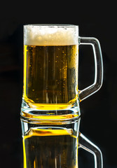 A glass of cold beer macro photography