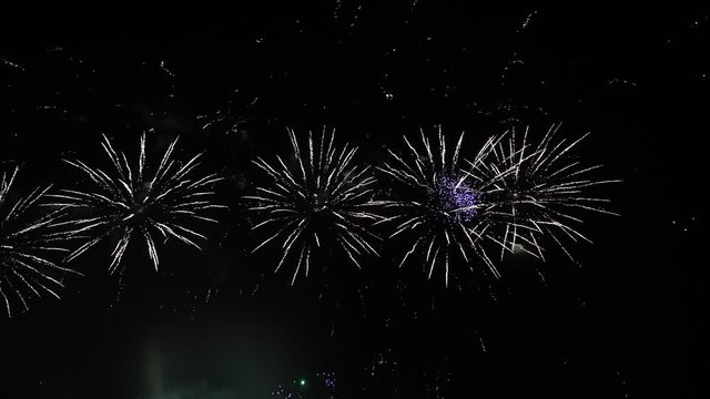 4K footage fireworks on deep black night sky