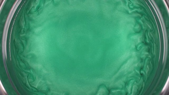 Rheoscopic fluid. Beautiful movement of particles in a liquid. Fantastic patterns and shapes. 50 fps