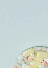 Colorful tablets in a bowl flatlay