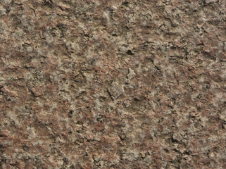 Naklejka premium Red marble stone texture picture with reliefs at sunset