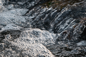 water flowing into the river