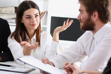 Group of people deliberate on white board problem in office closeup. Graph consult idea participate...