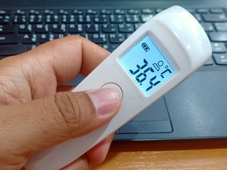 Medical digital thermometer to check Body temperature before work and check for the spread of the virus. COVID-19 is a virus that occurs worldwide.
