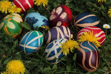Easter eggs colorful painted on grass background