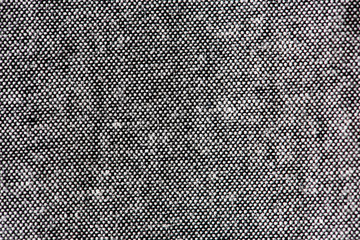 Black with white spots fabric background