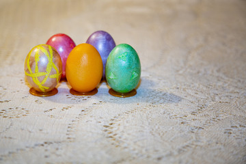 Painted festive Orthodox Easter eggs on a light background