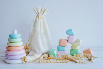 Colorful wooden toys and an eco-bag.