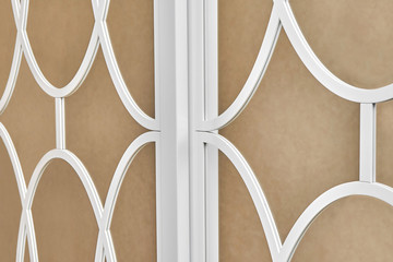 Sliding mirror wardrobe doors with overlays decor. White sliding mirror wardrobe