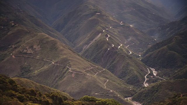 View from above of the Death Road, Bolivia, surrounded by mountain forests