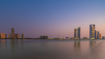 Fototapeta na wymiar Abu dhabi city skyline at sunset