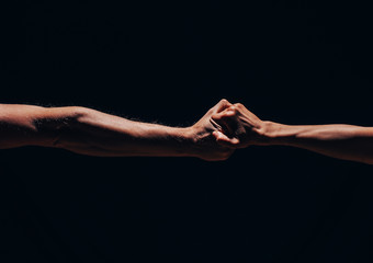 hands couple. Couple in love. Dark background. Shadow. Hand. Love photo. 