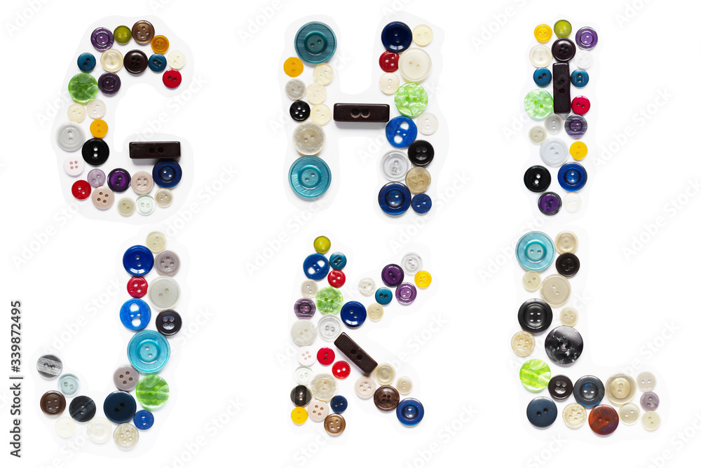 Fototapete multi-colored buttons from clothes in the form of letters of the alphabet
