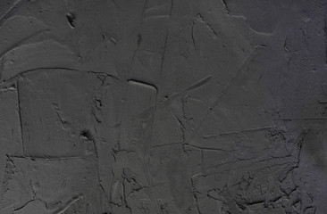 Closeup of dark grunge textured concrete background, place for text
