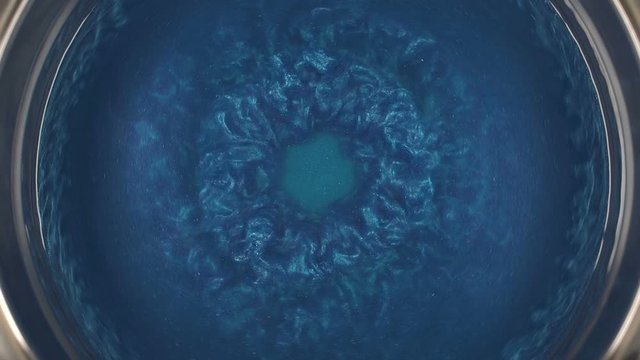Rheoscopic fluid. Beautiful movement of particles in a liquid. Fantastic patterns and shapes. 50 fps