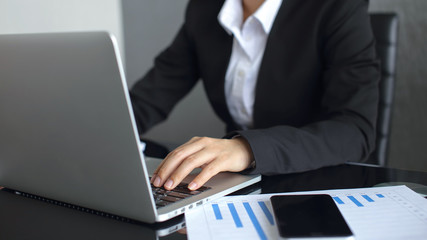 businesswoman working on laptop computer
