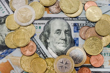 dollars and coins for the background. Close-up. Business concept. View from above.