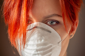 portrait of a young woman with a mask on her face