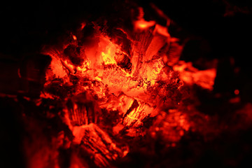 Fototapeta na wymiar Fireplace fire in closeup macro