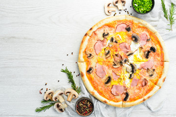 Delicious homemade pizza. Italian cuisine. Food delivery. Top view.