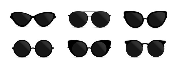 Set of fashionable black sunglasses on white background 