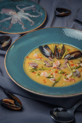 soup with vegetables mussels and squid