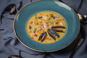 soup with vegetables mussels and squid