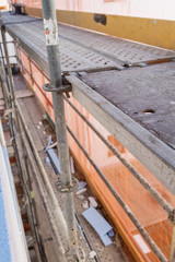 A close-up of an scaffold  for reforming a building