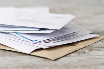 A stack of professional or invoice letters